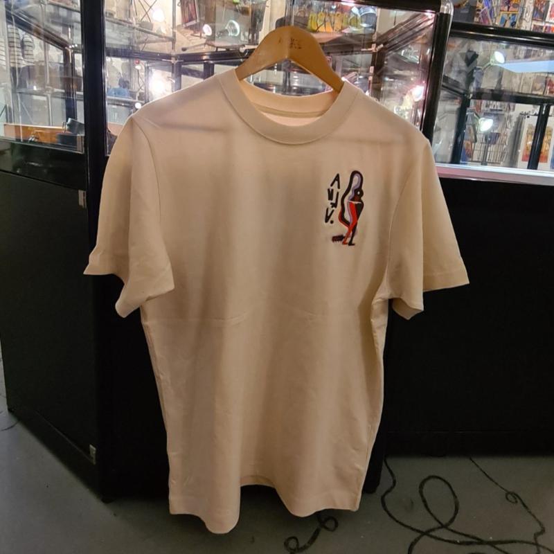 Shirt 'Gitaarvrouw' beige.